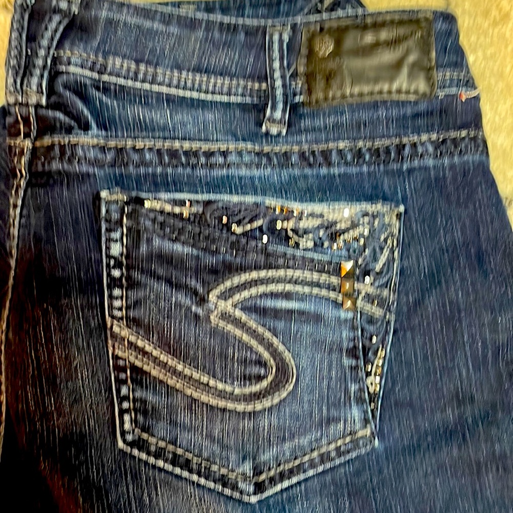 Size 18/31L Silver Suki Jeans dark wash with bling on front and back bootcut
